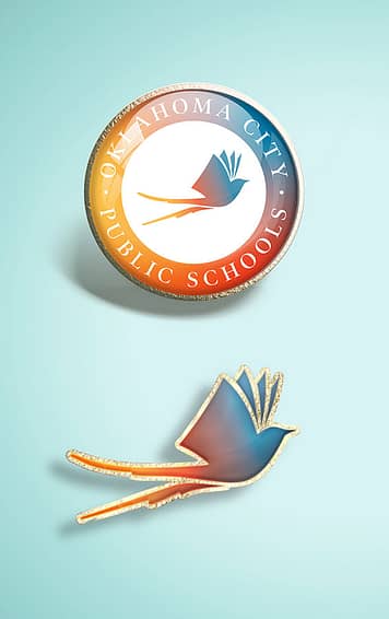 Lapel pin design for Oklahoma City Public Schools brand